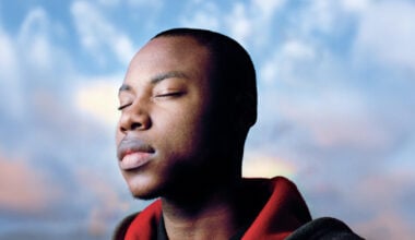 teenager facing ahead with closed eyes