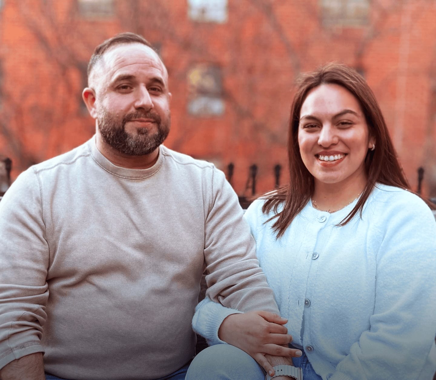 man and woman holding hands