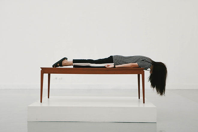 Woman laying on a table
