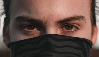 Man with severe stare and crossed brows