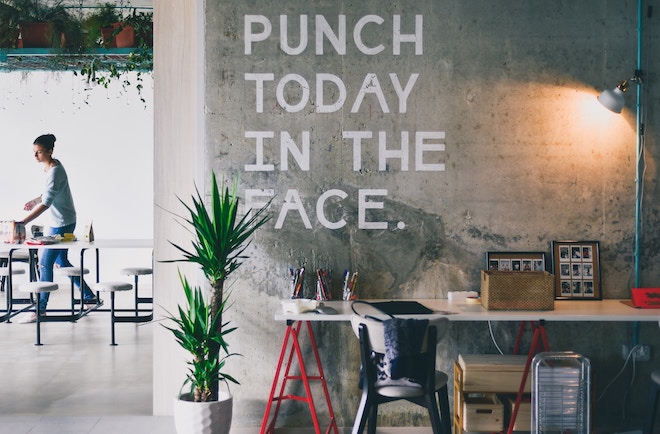 a wall tells you to "punch today in the face"