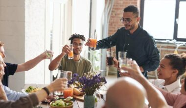 friends toasting at a meal