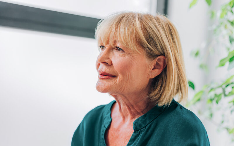 woman sitting looking ahead