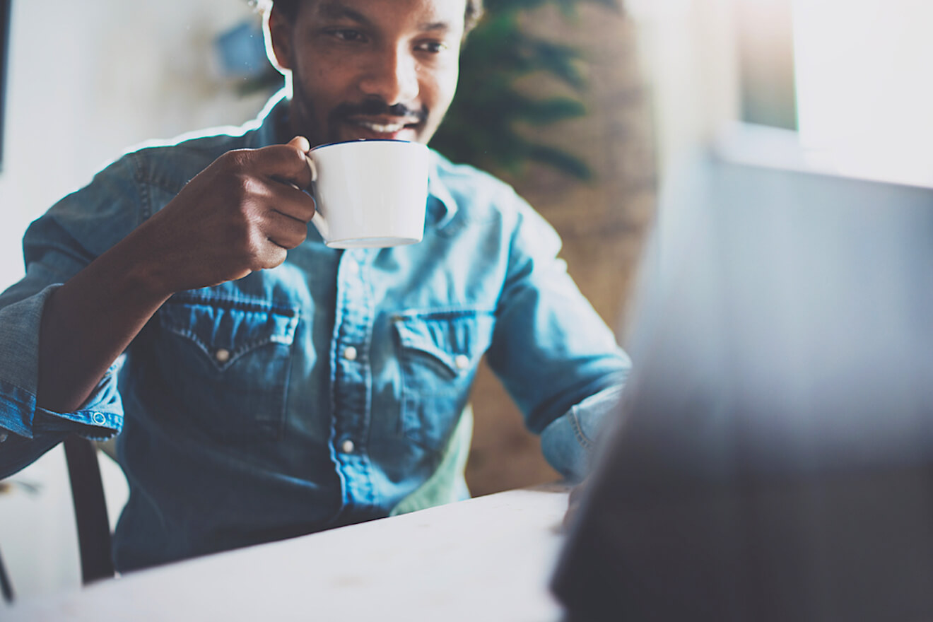 Young handsome man with coffee