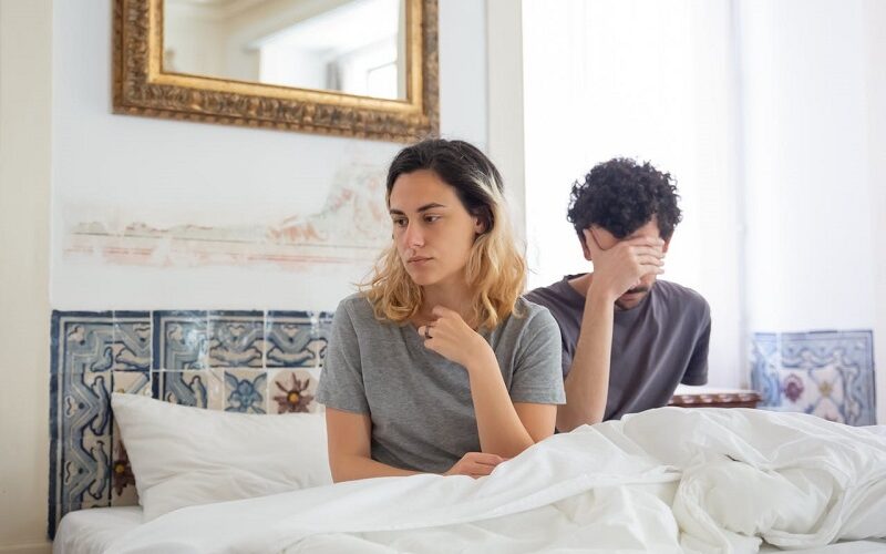 couple sitting in bed together
