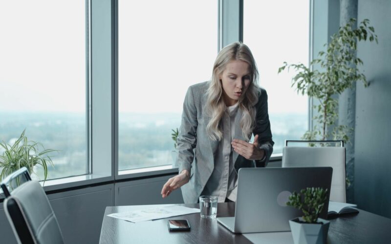 woman yelling at computer