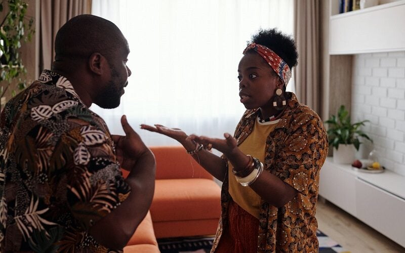 Couple arguing in the living room