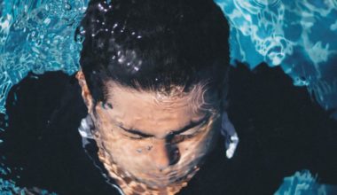 guy submerged under water