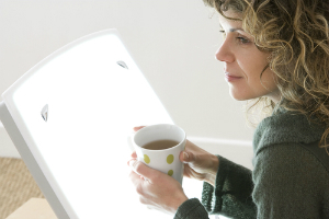 woman coffee light therapy