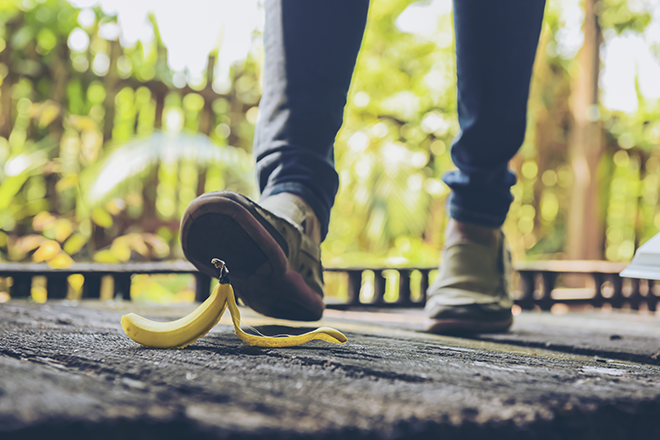 Person stepping on a banana