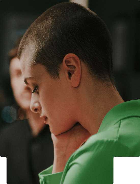 Side profile of a person looking down