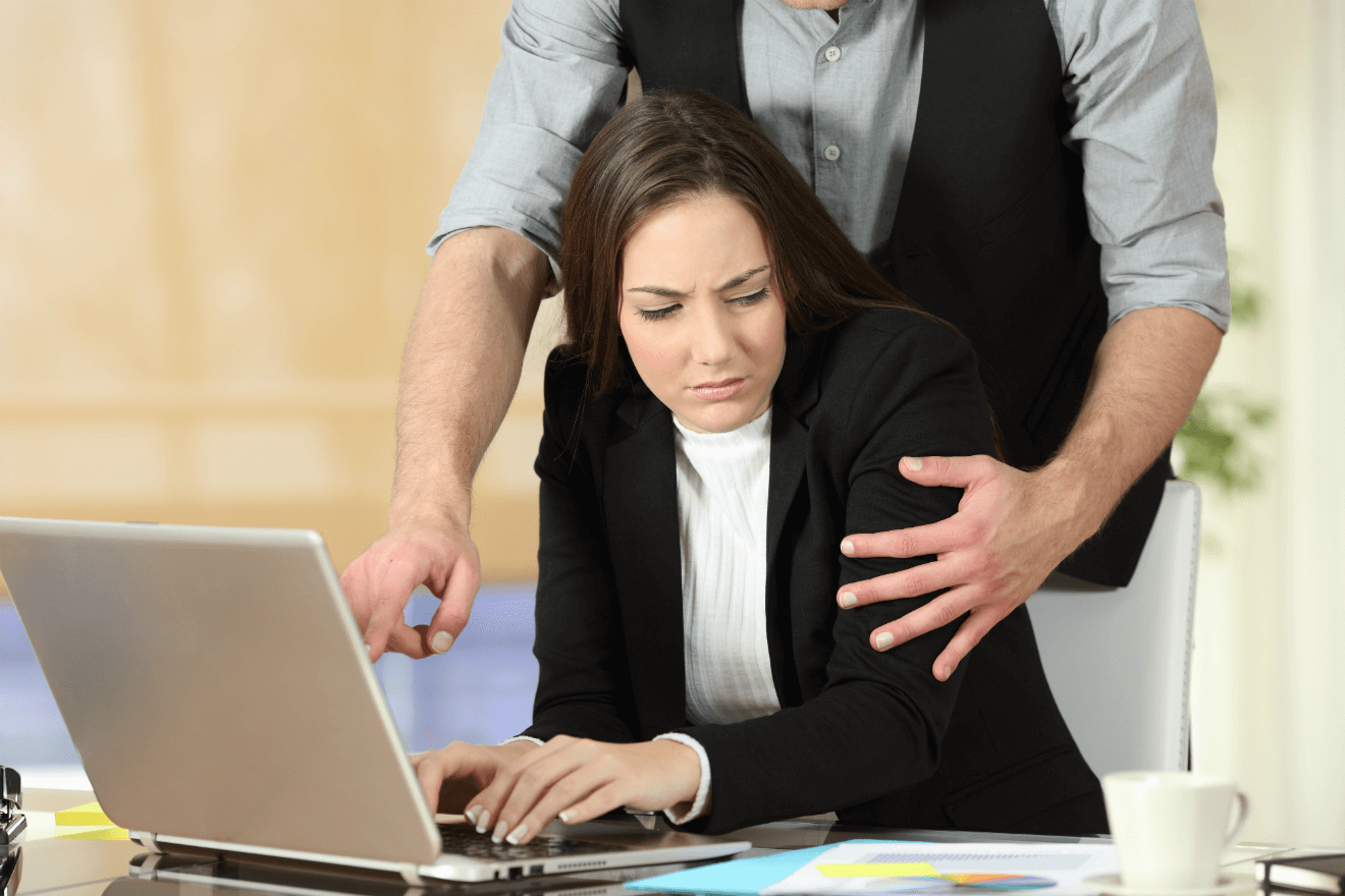 women at work uncomfortable with male co-worker touching her on arm
