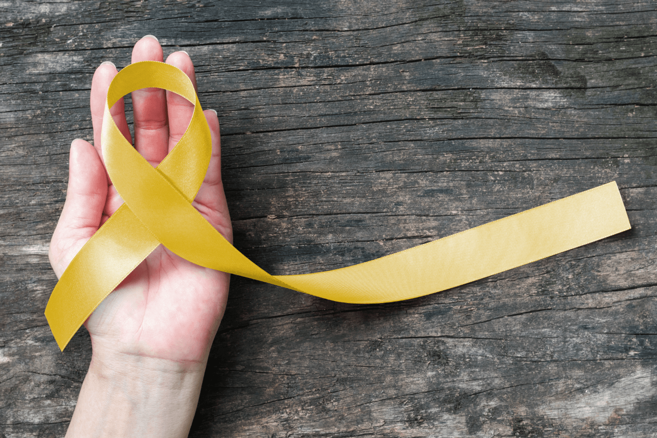 suicide prevention yellow ribbon hand wood